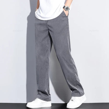 Brand Clothing Summer New Soft Lyocell Fabric Jeans Men Blue Elastic Waist Loose Straight Thin Denim Trousers Male Plus Size 5XL