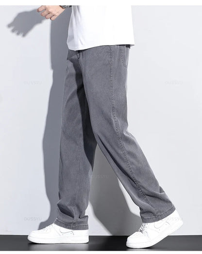 Brand Clothing Summer New Soft Lyocell Fabric Jeans Men Blue Elastic Waist Loose Straight Thin Denim Trousers Male Plus Size 5XL