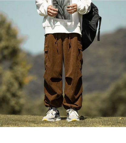 2025 autumn and winter new retro brown corduroy multi pocket workwear pants for men, loose drawstring elastic waist pants
