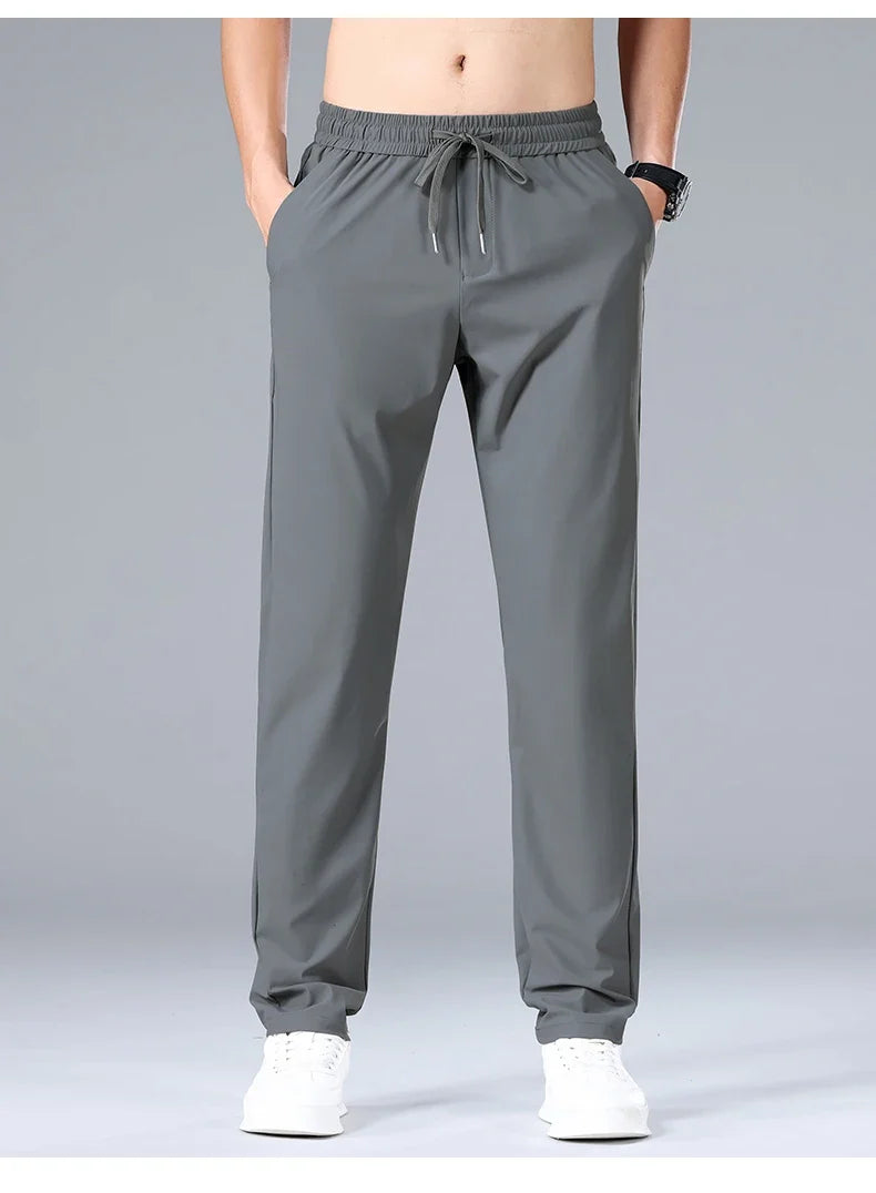 High Quality Ice Silk Stretch New Brand Casual Fashion Elastic Strappy Long Pants Street Style Pencil Teens Trousers Men Clothes