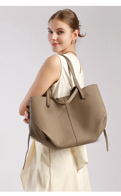 2025 Fall Winter New Top Grain Leather Spacious Boston Bag Lock Design Single Shoulder Crossbody Pack Women Commuting Handbag