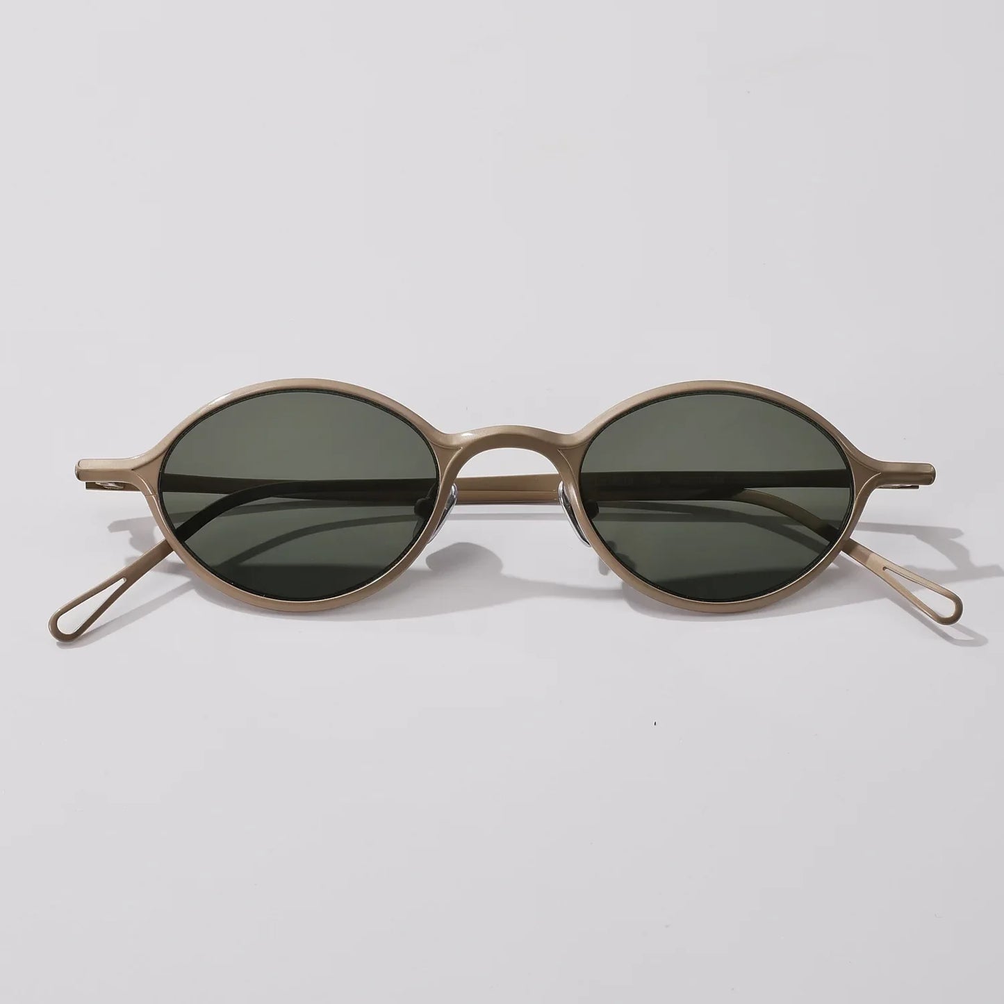New Top Quality Titanium Summer Women Versatile Oval Sunglasses Outdoor Fashion Beach Driving Sunscreen UV400 Men Sun Glasses