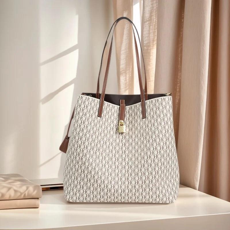 Women's Large Capacity Commuter Essential Shoulder Bag Multi functional Design Printed with Brand Pattern 2026 New Bucket Bag