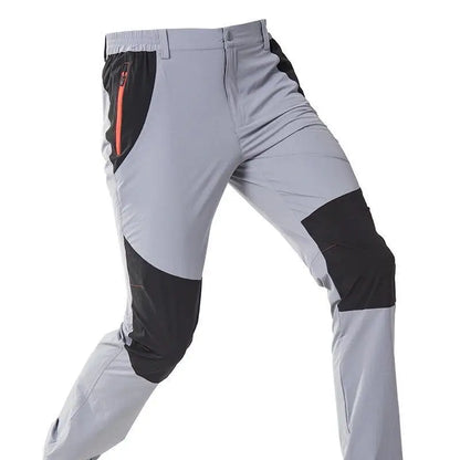 New Summer Men Thin Multi Pocket Work Pants Outdoor Casual Sports Breathable Cargo Pants Straight Leg Loose Tooling Trousers 4XL