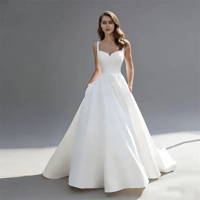 Customized Elegant V-Neck Wedding Dress Long Satin Bridal Gown A-line Backless Buttons Spaghetti Straps Bride Dress with Pockets