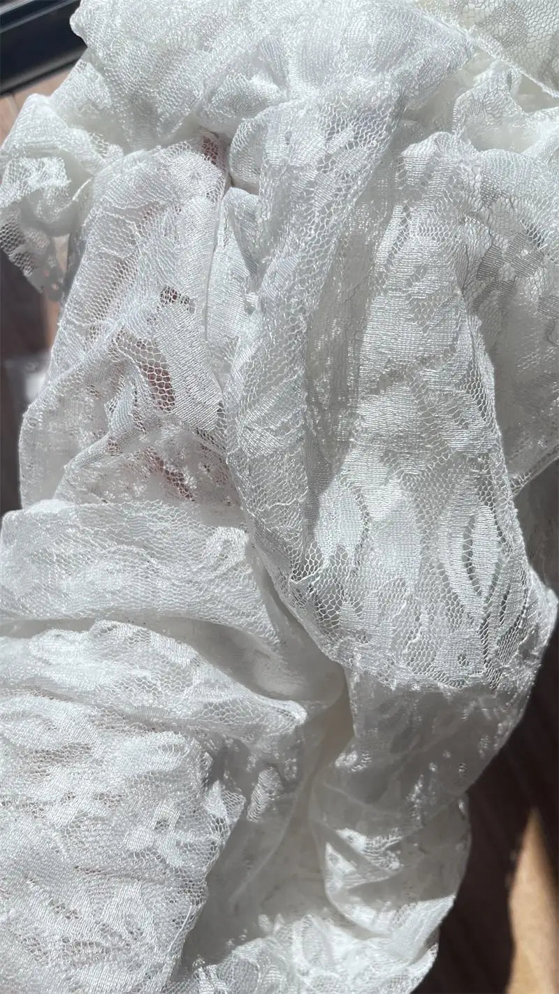 Shestyle تنانير طويلة شفافة من الدانتيل للنساء بكسرات زهرية غير متماثلة صيف 2025 ملابس جديدة أنيقة لقضاء العطلات بشق أنيق