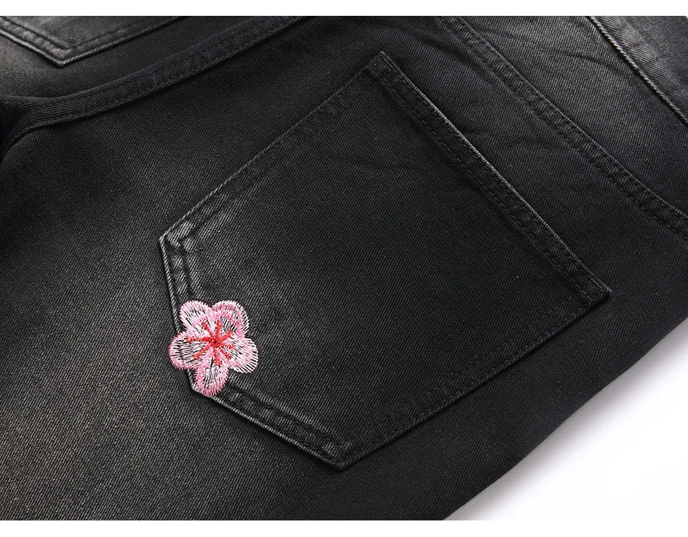 Men Sakura Embroidery Denim Jeans Streetwear Boot Cut Pants Released Hem Flared Trousers with Ripped And Cherry Blossom Design