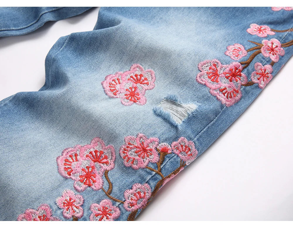 Men Sakura Embroidery Denim Jeans Streetwear Boot Cut Pants Released Hem Flared Trousers with Ripped And Cherry Blossom Design