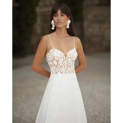 2026 Customized A line Bridal Gown Lace Applique Spaghetti Straps Backless Wedding Dress for Elegant Brides