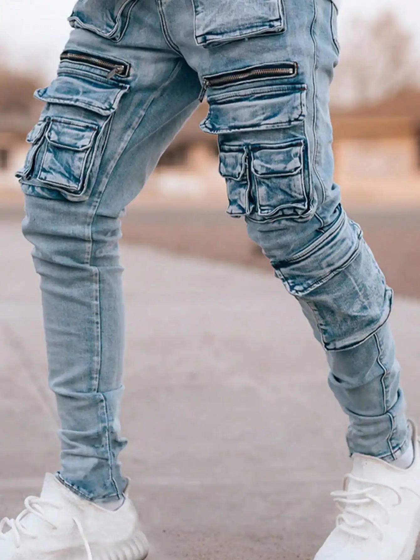 Men’s streetwear, multi pocket vehicle, snug, stretchy, light-colored jeans.