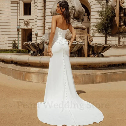 Simple Pleat Strapless Sheath Wedding Dress Sexy Open Back with Buttons Sweep Train Bridal Sleeveless Side Slit Customized Gown