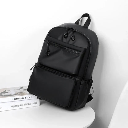 1Pcs 14-inch Fashion Casual Backpack, Spacious Laptop Compartment,Waterproof Fabric,Ideal for Men, Students, and Professionals