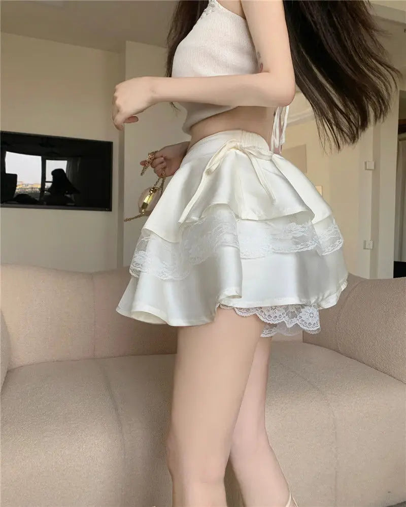 تنانير قصيرة بيضاء، نسائية، مزينة بالدانتيل، حلوة، منفوشة، مثيرة على الطراز الفرنسي، مكشكشة، ذات ثنيات، خصر مرتفع، صيفية، متعددة الطبقات، رومانسية، للبنات