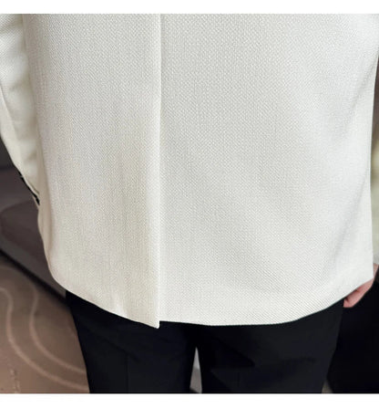 The new Chinese-style collarless suit is fashionable, handsome and versatile. It is a solid-color Korean-style fitted and fashio