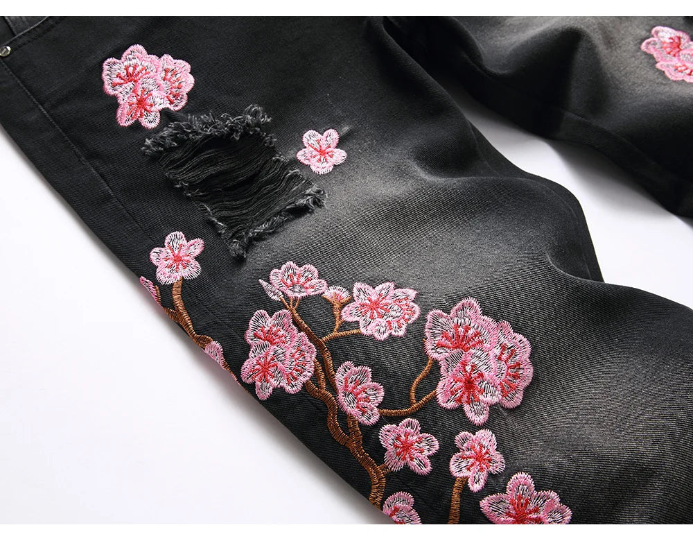 Men Sakura Embroidery Denim Jeans Streetwear Boot Cut Pants Released Hem Flared Trousers with Ripped And Cherry Blossom Design