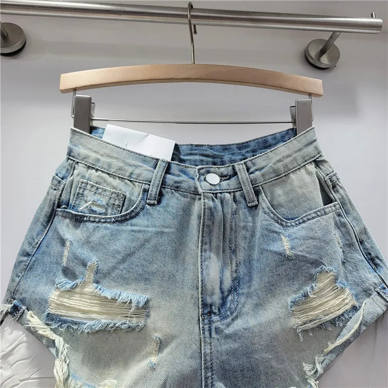 2026 Summer New Women's Pink Hole Denim Shorts High Waist Slimming Spicy Girl A-line Ragged Edge Shorts