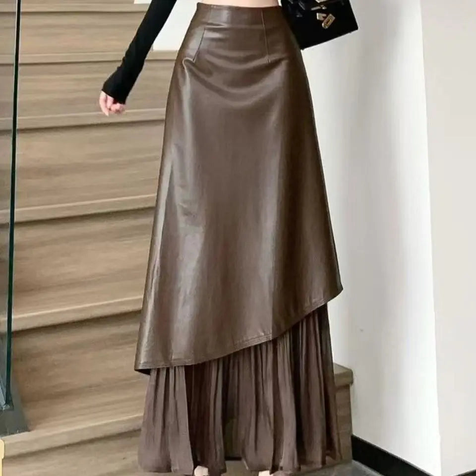 تنورة نسائية ريترو، تنورة طويلة بخصر عالٍ وقصة A-line بتصميم جديد للخريف المبكر من الجلد بخياطة غير متماثلة