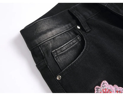 Men Sakura Embroidery Denim Jeans Streetwear Boot Cut Pants Released Hem Flared Trousers with Ripped And Cherry Blossom Design