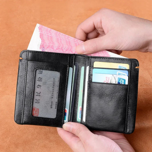 Portefeuille en cuir de vachette couche supérieure Portefeuille en cuir véritable souple Porte-cartes de crédit pour hommes Sac à main de luxe Noir Élégant Simple Portefeuilles pour hommes