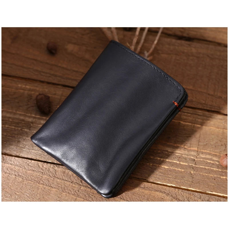 Portefeuille en cuir de vachette couche supérieure Portefeuille en cuir véritable souple Porte-cartes de crédit pour hommes Sac à main de luxe Noir Élégant Simple Portefeuilles pour hommes