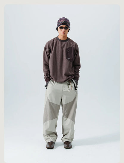 Mountain-Ready Crewneck: Engineered with Ribbed Neck, Reflective Logo, & Secure Chest Pocket for Outdoor Style Unisex