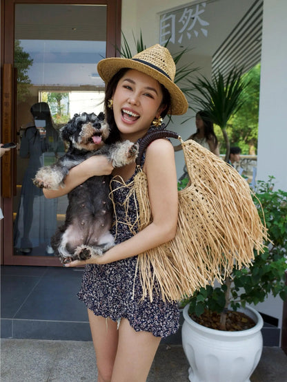 Pure hand-woven women's bags niche design ethnic holiday style straw woven fringed portable shoulder women's bags