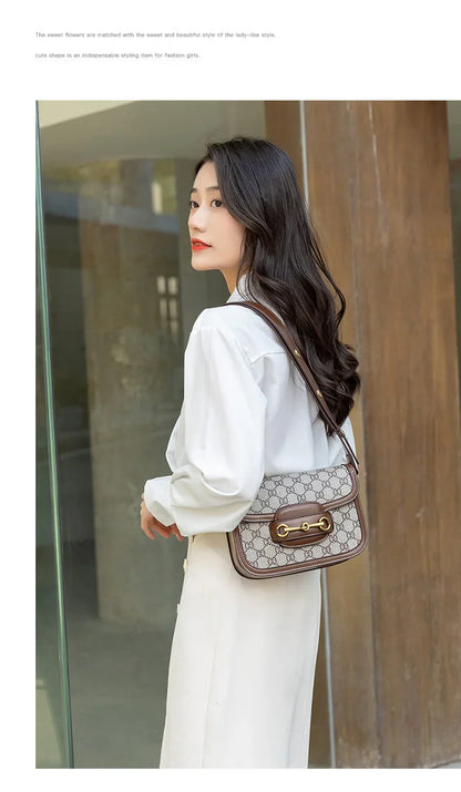 Ladies genuine leather saddle bag, single shoulder bag underarm bag, new fashion versatile niche trend crossbody bag.