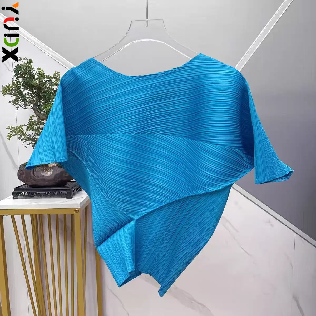 Vibrant Cyan Blue Miyake Pleated Asymmetric Short Sleeve Top, Irregular Hem Women's Casual All Match Modern Stylish Blouse