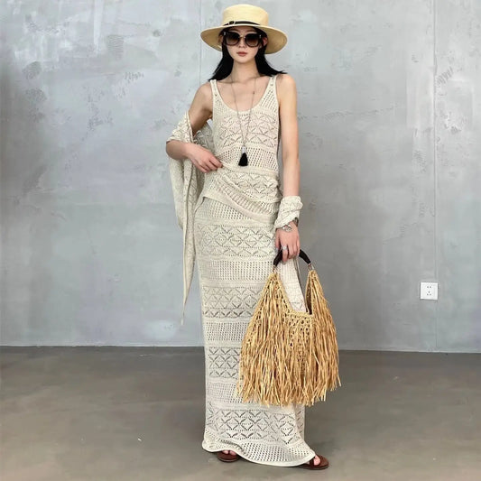 Pure hand-woven women's bags niche design ethnic holiday style straw woven fringed portable shoulder women's bags