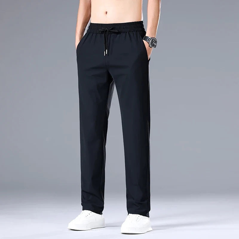 High Quality Ice Silk Stretch New Brand Casual Fashion Elastic Strappy Long Pants Street Style Pencil Teens Trousers Men Clothes