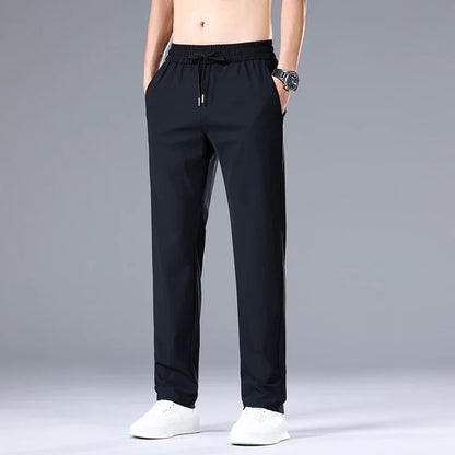 High Quality Ice Silk Stretch New Brand Casual Fashion Elastic Strappy Long Pants Street Style Pencil Teens Trousers Men Clothes