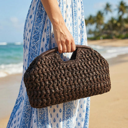Seaside vacation style grass woven bag, spring and summer new style, European and American high-end feeling, hand-held gold clip